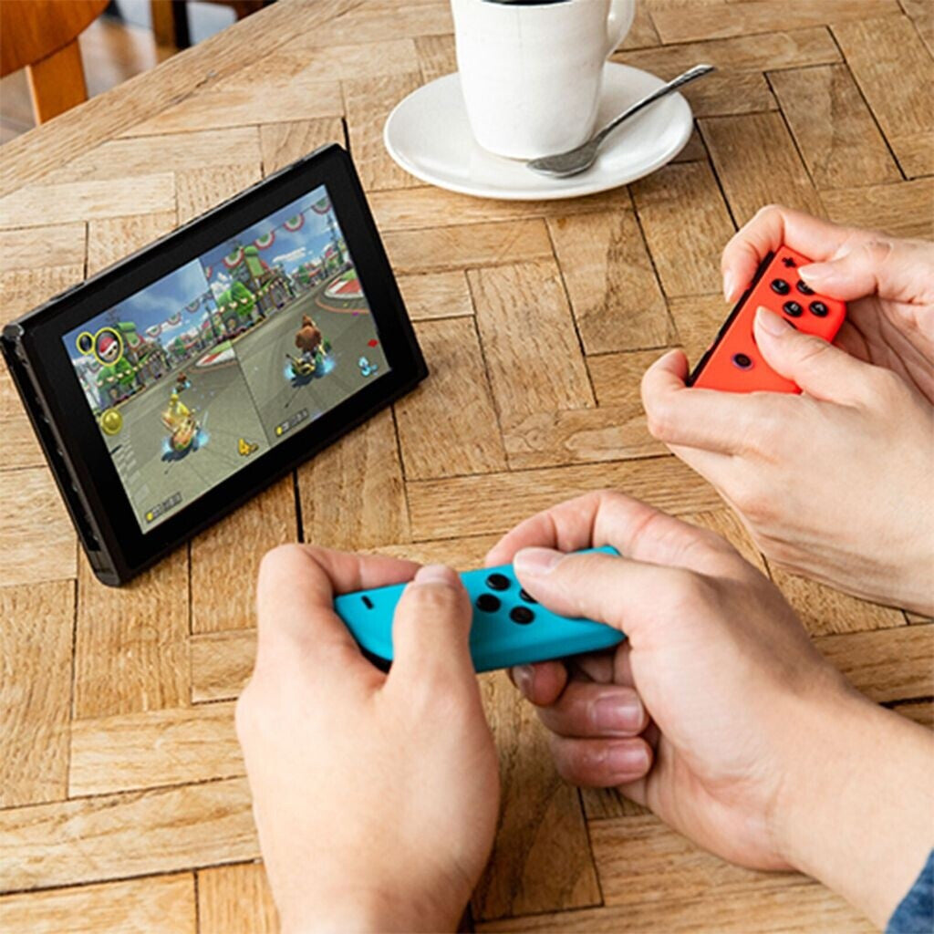 Nintendo Switch 1.1 Joy-Con Rosso Neon/Blu Neon + Nintendo Switch Sports + 12 Mesi Nintendo Switch Online